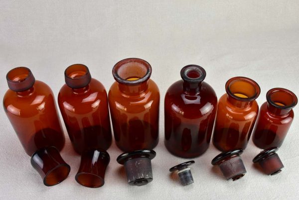 Collection of six amber pharmacy jars with lids - 19th Century on Sale