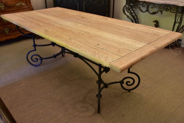 Antique French oak dining table with iron base For Sale