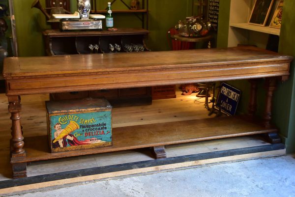 Antique French oak drapery table from a silk boutique Supply