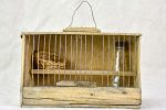 Small 1920 s birdcage with nest and water Fashion