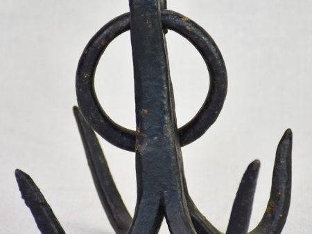 Weighty iron hooks from a water well Supply