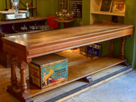 Antique French oak drapery table from a silk boutique Supply