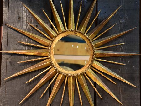 Vintage sunburst mirror with gilded metal frame For Sale