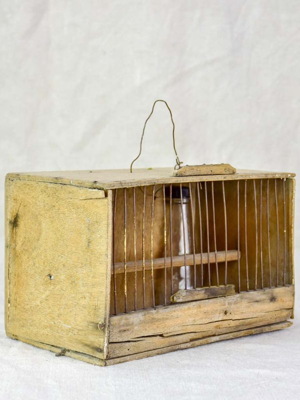 Small 1920 s birdcage with nest and water Fashion