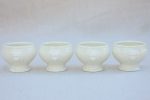 Four miniature earthenware cream bowls Online