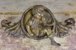 Late 18th Century salvaged giltwood medallion - cherub on Sale