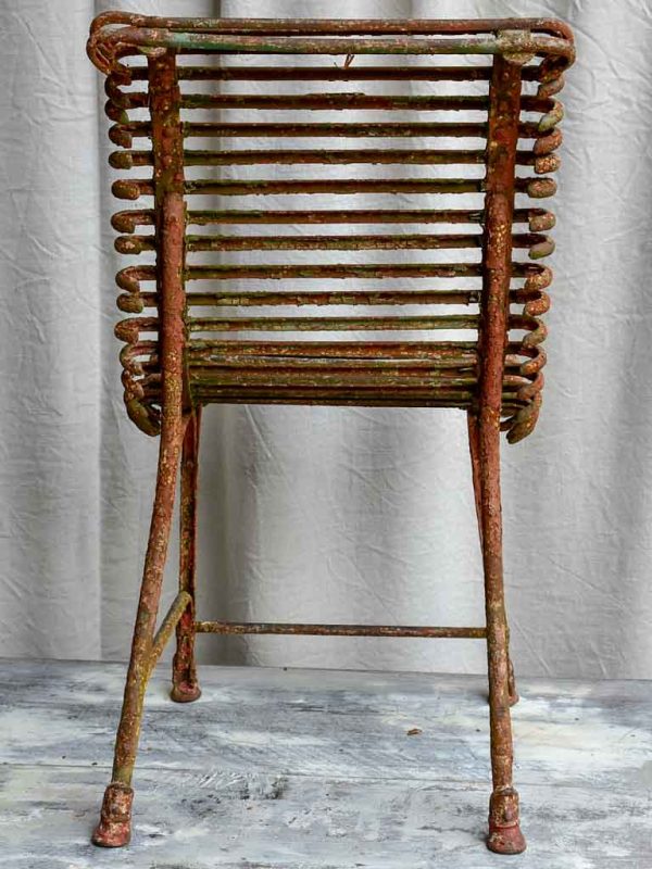 Pair of antique French Arras garden chairs with scrolled edges Online now