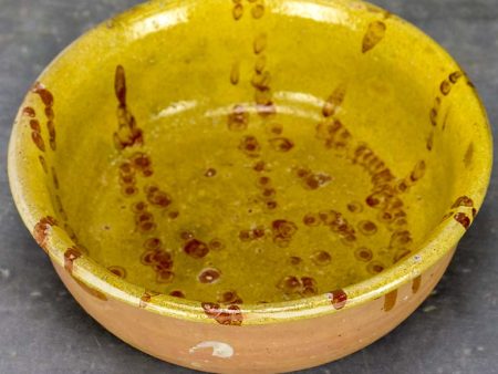 Antique French clay bowl with spotted glaze Online