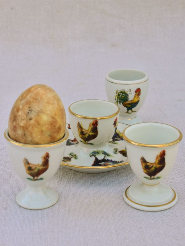 Four 1920 s French porcelain egg cups with chicken and rooster transfers Online now