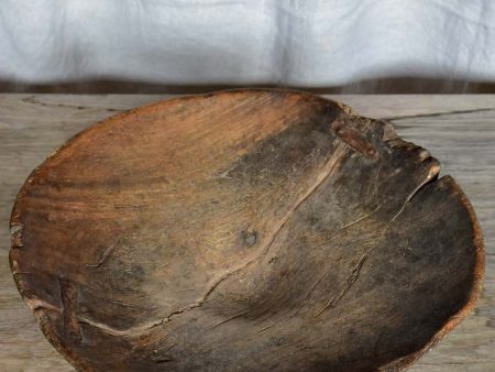 Antique primitive raised wooden bowl Online