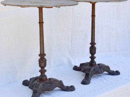 Pair of antique French garden tables with cast iron base Online