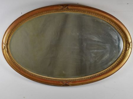 Early twentieth-century oval French mirror with bronzed glass 34¼  x 21¾  Hot on Sale