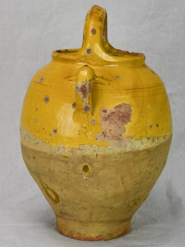 Antique French water cruche with yellow glaze Online