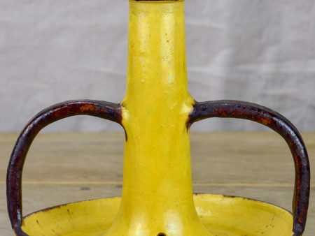 1930 s Etienne Noel ceramic candlestick with yellow and brown glaze For Sale