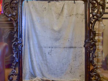 Large late 18th Century carved wood mirror with original black patina and aged glass 45¾  x 63½  For Cheap