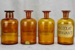 Four antique French apothecary jars with original glass lids - amber Hot on Sale