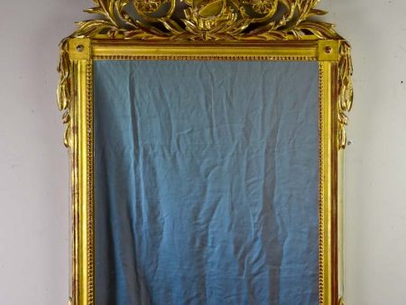 Louis XVI-style gilded mirror with musical floral crest and motifs 26½  x 46¾  Online Sale