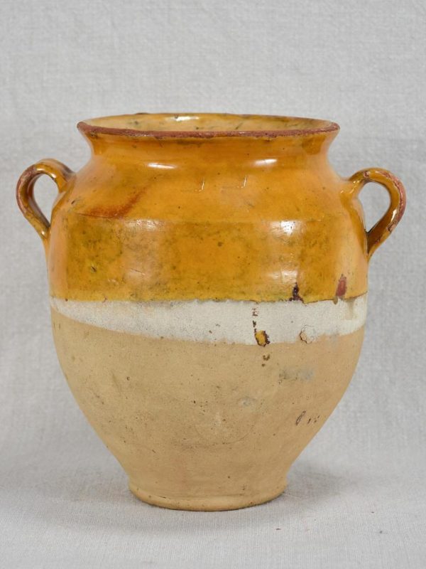 Small antique French confit pot with yellow   orange glaze and two handles 8¼  on Sale