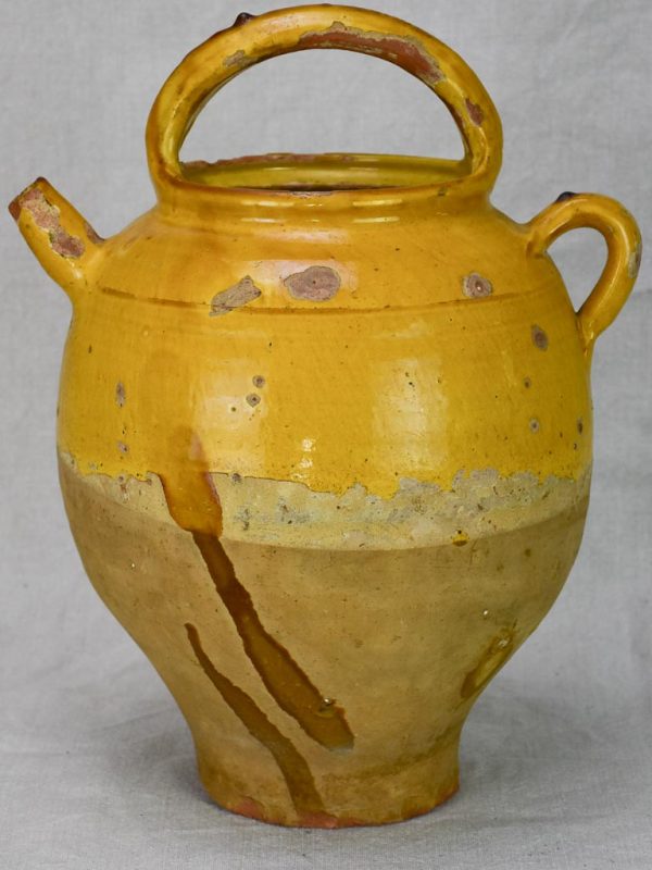 Antique French water cruche with yellow glaze Online