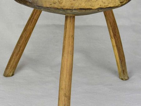 Antique French primitive milking stool with repairs on Sale