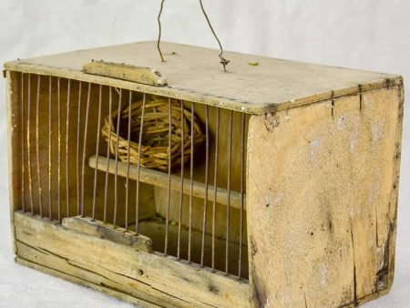 Small 1920 s birdcage with nest and water Fashion