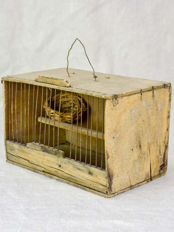 Small 1920 s birdcage with nest and water Fashion