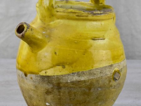 Late 19th Century French water pitcher with yellow glaze For Sale