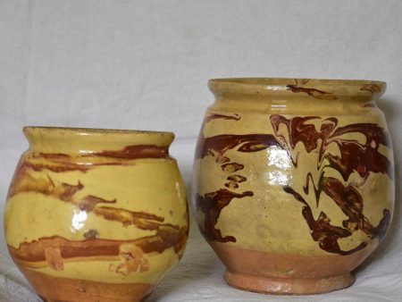 Two clay marbleized honey   preserving pots from Apt 7  Online