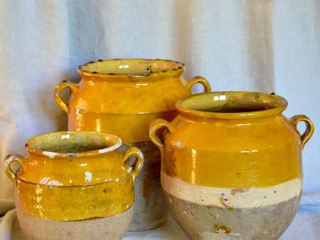 Collection of three antique French confit pots with ochre glaze on Sale