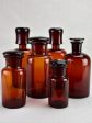 Collection of six amber pharmacy jars with lids - 19th Century on Sale