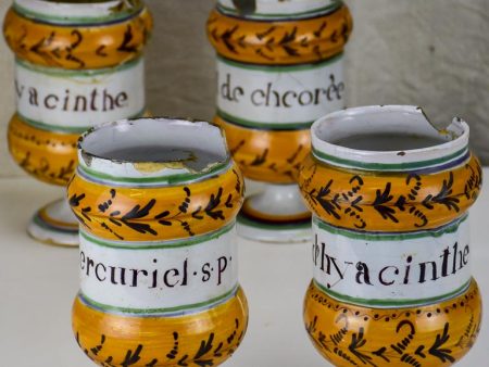 Collection of four antique French apothecary jars Online now