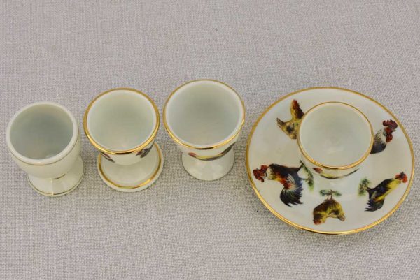 Four 1920 s French porcelain egg cups with chicken and rooster transfers Online now