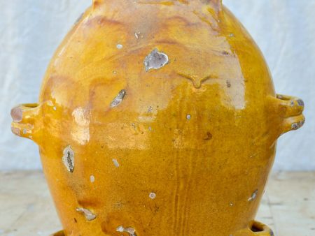 Antique French conscience water jug with yellow glaze Online now