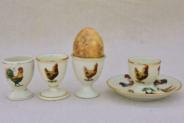 Four 1920 s French porcelain egg cups with chicken and rooster transfers Online now