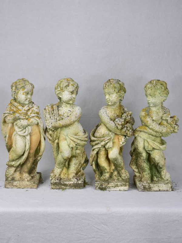 Collection of four vintage cherubs representing the four seasons - weathered patina 19¼  Discount