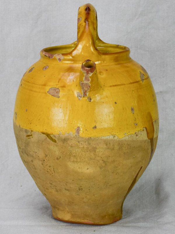 Antique French water cruche with yellow glaze Online