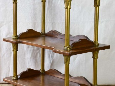 Early twentieth century shelving unit with bronze frame from a boutique 32¼  Online now