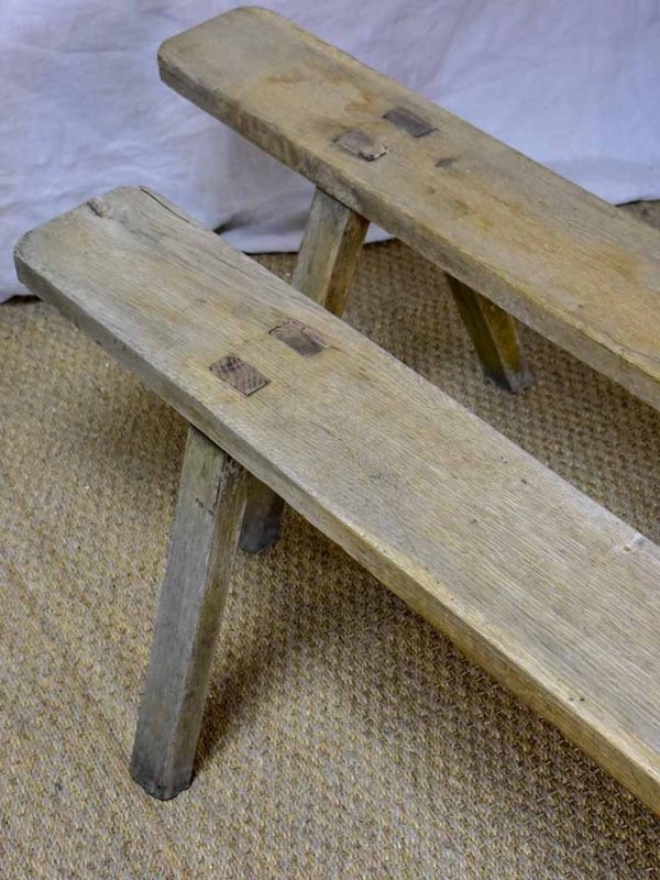 Pair of rustic antique French benches with splayed feet For Sale