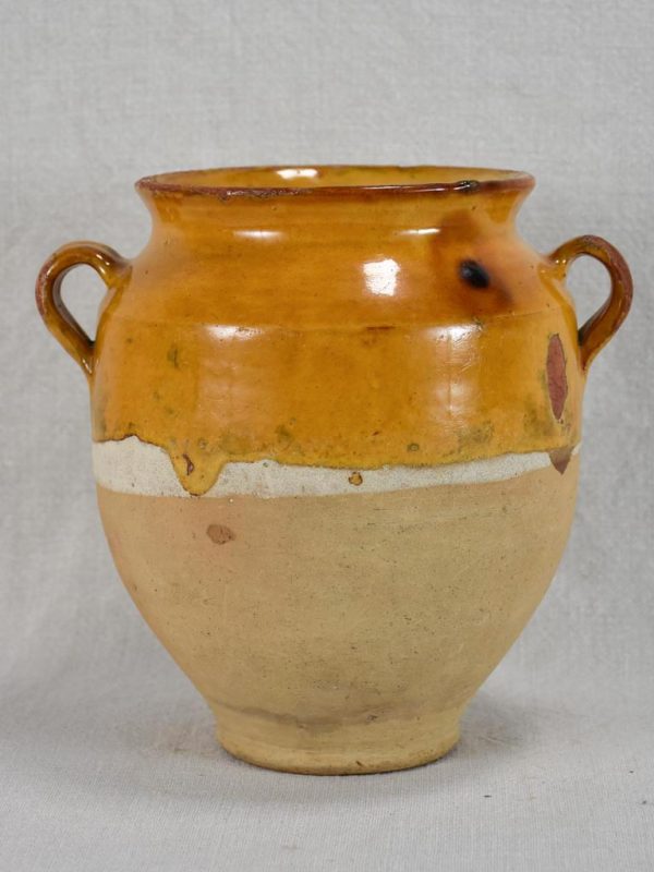 Small antique French confit pot with yellow   orange glaze and two handles 8¼  on Sale