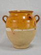 Small antique French confit pot with yellow   orange glaze and two handles 8¼  on Sale