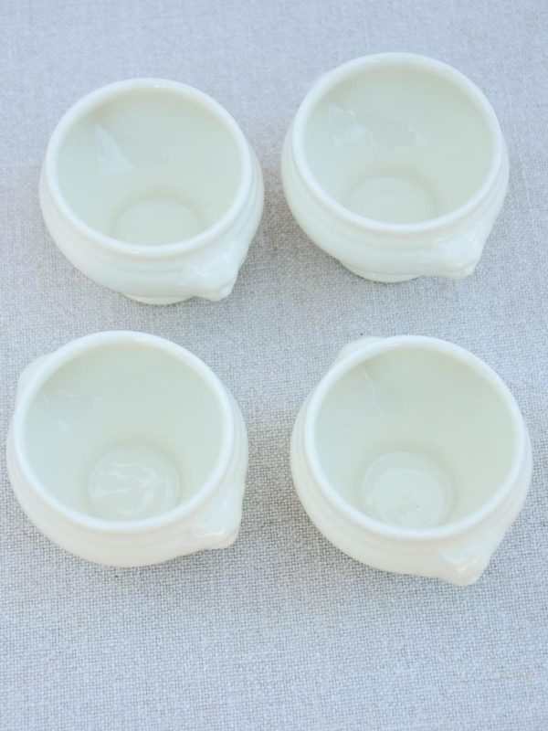 Four miniature earthenware cream bowls Online