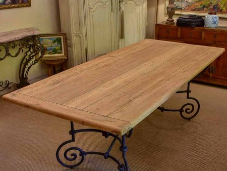 Antique French oak dining table with iron base For Sale