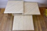 Three vintage travertine nesting side tables Discount