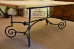 Antique French oak dining table with iron base For Sale