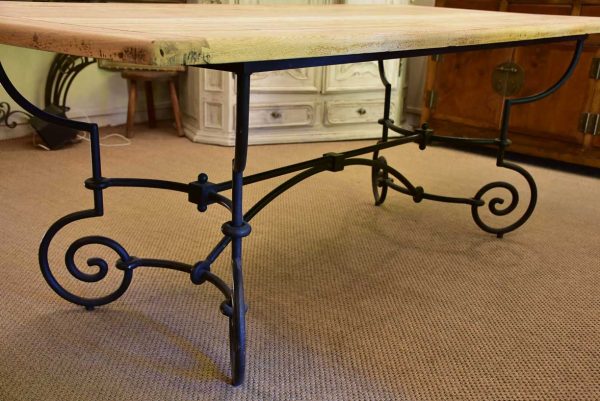 Antique French oak dining table with iron base For Sale