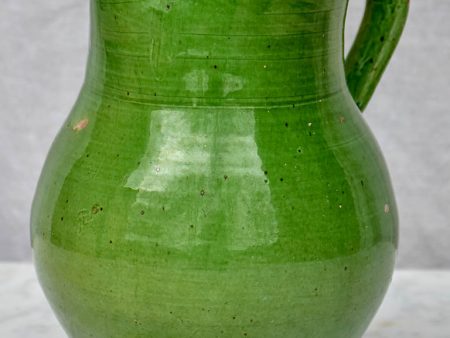 Antique French pitcher with green glaze Online now