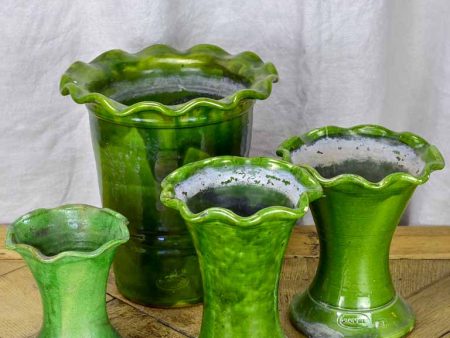 Set of four vintage French florist vases with green glaze and rippled necks Online