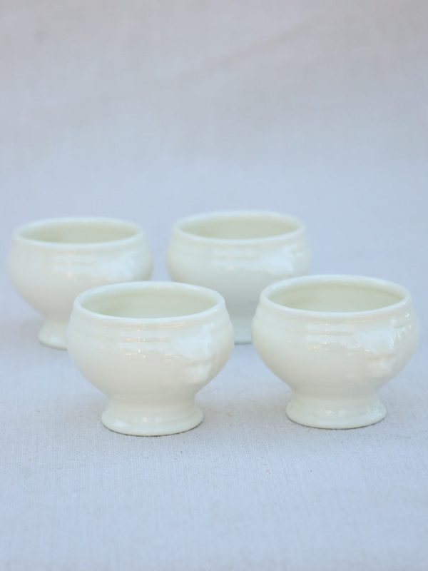 Four miniature earthenware cream bowls Online