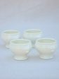 Four miniature earthenware cream bowls Online