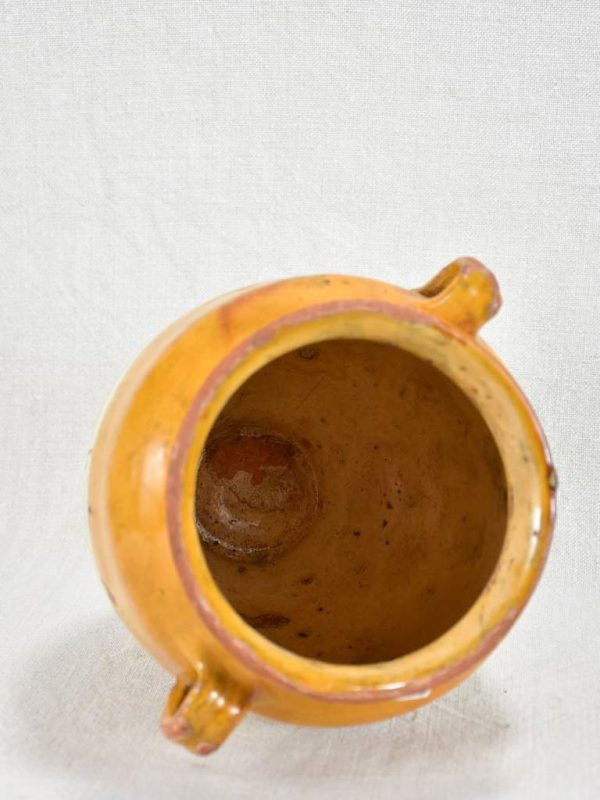 Small antique French confit pot with yellow   orange glaze and two handles 8¼  on Sale